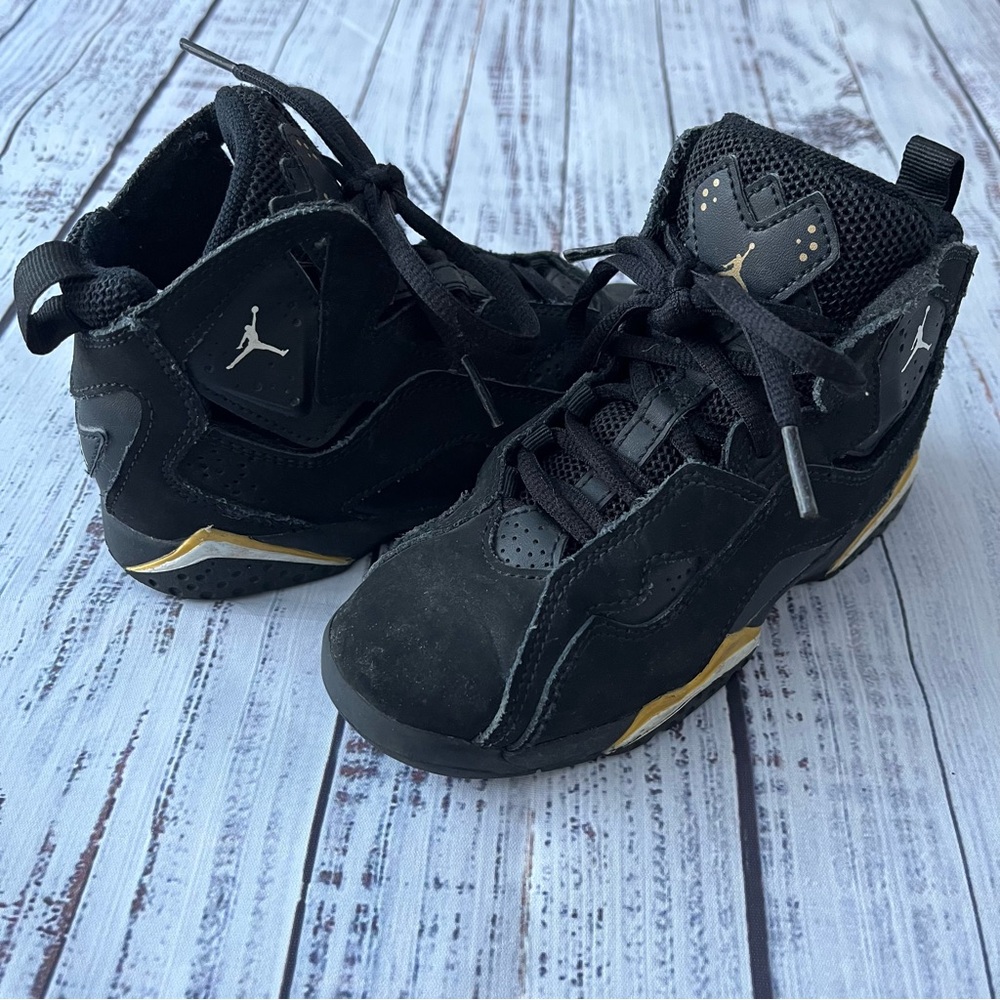 Nike Air Jordan True Flight in a black and gold colorway Kids Size 12C